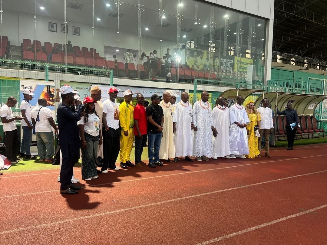 Chiefs and dignitaries gathered beside the running track
