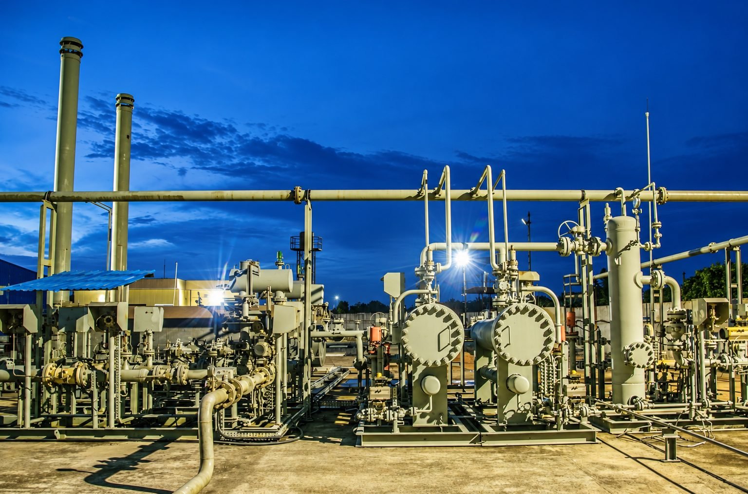 YongXing gas facility lit at dusk